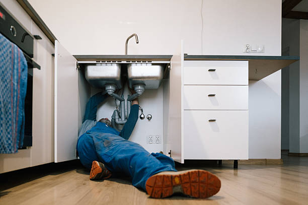 Professional Emergency Plumber technician working in Taylorsville, GA
